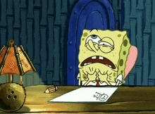a cartoon of spongebob sitting at a desk with a pencil