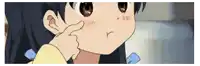 a close up of a girl 's face with a hand on her nose