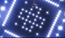 a blue background with white dots and a person in the center
