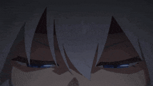 a close up of a person 's eyes with a blue light coming out of them