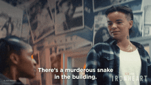 a woman talking to another woman with the words " there 's a murderous snake in the building " on the bottom