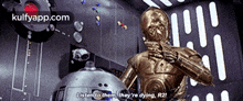 a statue of a robot says " listen to them they 're dying r21 "