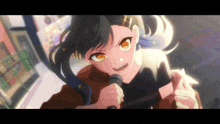 a girl is singing into a microphone with her mouth open