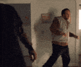 a blurry picture of a man in a room