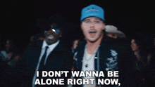 a man in a blue hat says i do n't wanna be alone right now