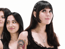 a woman with a tattoo of monkey d luffy on her shoulder