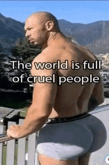 a man in underwear is standing on a balcony .