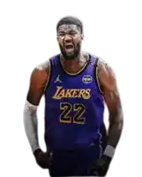 a basketball player wearing a purple lakers jersey is standing with his arms outstretched .