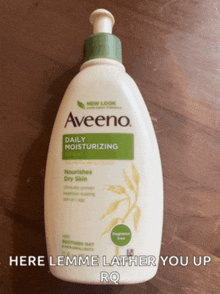 a bottle of aveeno daily moisturizing lotion is on a table