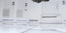 a man in a black shirt is floating in the air