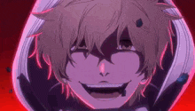 a close up of a person 's face with a hood on and a smile on their face .