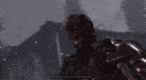 a screenshot of a video game shows a robot with blood on his head