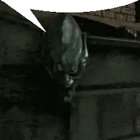 a close up of a statue of batman with a white speech bubble behind him