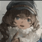 a close up of a girl wearing a hat and pointing at something .