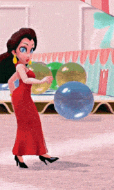 a woman in a red dress is holding a blue balloon