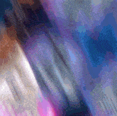 a close up of a purple and blue colored background