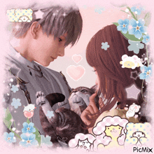 a picture of a man and a woman holding a cat with a picmix watermark