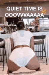 a woman in white underwear is squatting down in front of a bar with the words quiet time is ooovvvaaa written on the bottom