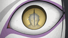 a close up of a person 's eye with a yellow circle in the middle