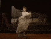 a woman is dancing with the words well if you want bread and respect and attention below her