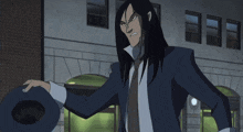 a cartoon character with long black hair is holding a blue object