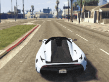a white sports car with a license plate that says a3796k