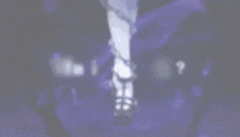 a person with chains around their ankles and the words what is your wish
