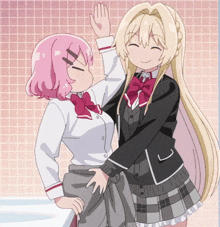 a girl with pink hair is giving a high five to another girl with blonde hair