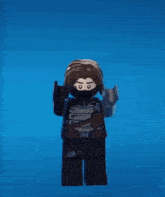 a lego figure with a mask on his face