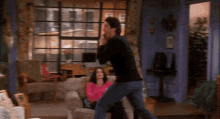 When Ross Handed Chandler A Lamp Ross GIF - When Ross Handed Chandler A Lamp Ross Chandler GIFs