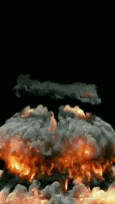 a large explosion with smoke and fire coming out of it