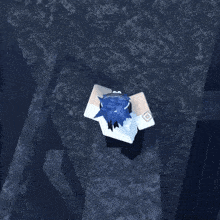 a person with blue hair is standing in a dark cave