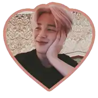 a picture of a man with pink hair in a heart shape