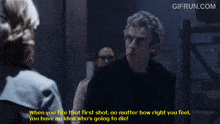 a gif from gifrun.com shows a man and woman talking