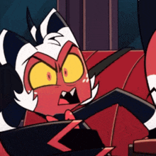 a cartoon character is sitting on a couch with a surprised look on his face