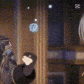 a couple of anime characters are standing next to each other in a room with a blue ball flying in the air .