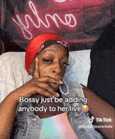 a woman with red hair says bossy just be adding anybody to her live on a tiktok video
