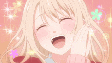 a girl with blonde hair and a flower in her hair