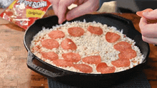 Spreading Pepperoni The Hungry Hussey GIF - Spreading Pepperoni The Hungry Hussey Adding Pepperoni GIFs