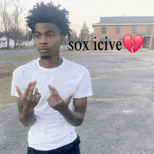 a man in a white shirt is standing in a parking lot with a broken heart and the words sox icive above him