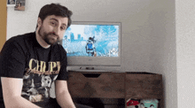 a man wearing a t-shirt that says ' choppy ' on it