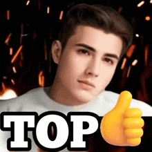 a young man giving a thumbs up with the word top behind him
