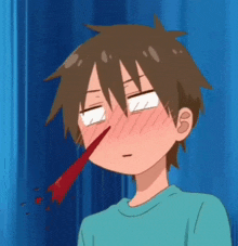 a boy with a bloody nose is making a funny face