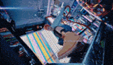 a person wearing a pair of yellow timberland boots is playing a game