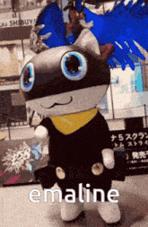 a mascot is standing in front of a sign that says shibuy