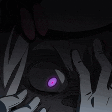 a close up of a person 's face with purple eyes