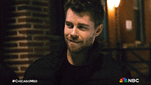 a nbc ad for chicagomed shows two men talking