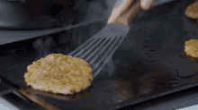 Flipping Sausage Patty Matty Matheson GIF - Flipping Sausage Patty Matty Matheson Cookin Somethin GIFs
