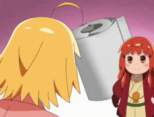 two anime characters are standing next to each other and one has a roll of toilet paper on her head