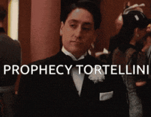 a man in a tuxedo with the words prophecy tortellini written on the bottom